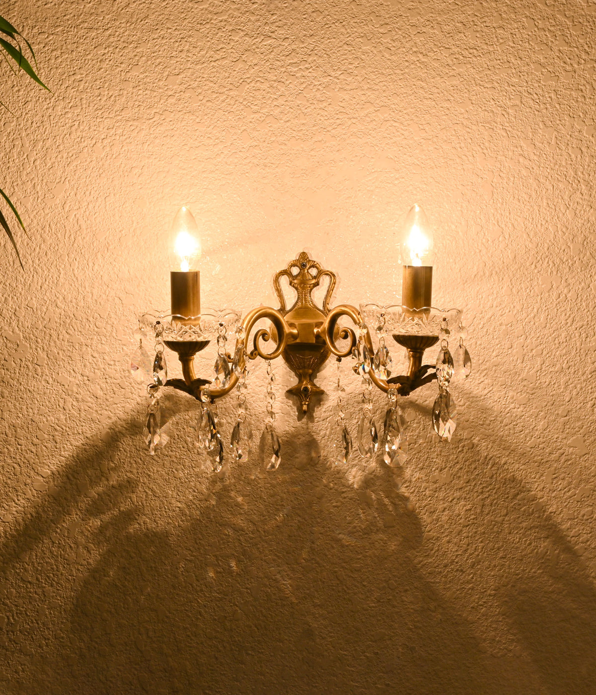 Radiant Crystal Brass Sconce